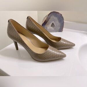 Micheal Kors tan pumps size 10.